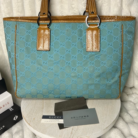 Gucci Handbags - Gucci GG Blue Canvas Tote with Brown Leather Trim with COA